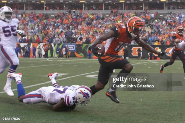 Tre'Davious White of the Buffalo Bills makes the tackle on A.J. Green of the Cincinnati Bengals during their game at Paul Brown Stadium on October 8,...