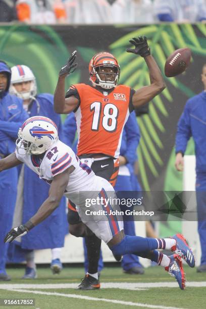 Tre'Davious White of the Buffalo Bills battles for the football with A.J. Green of the Cincinnati Bengals during their game at Paul Brown Stadium on...