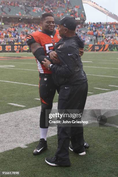 Head Coach Marvin Lewis and Vontaze Burfict of the Cincinnati Bengals share a moment during their game at Paul Brown Stadium on October 8, 2017 in...