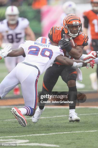 Jordan Poyer of the Buffalo Bills battles makes the tackle on Giovani Bernard of the Cincinnati Bengals during their game at Paul Brown Stadium on...