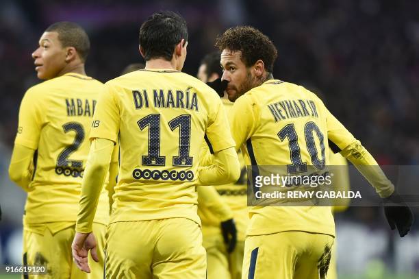 Paris Saint-Germain's Brazilian forward Neymar Jr celebrates opening the scoring with Paris Saint-Germain's Argentinian forward Angel Di Maria and...