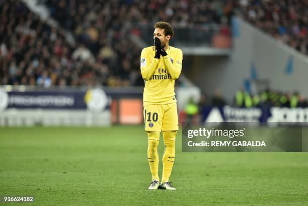 Paris Saint-Germain's Brazilian forward Neymar Jr reacts during the French L1 football match between Toulouse and Paris Saint-Germain on February 10,...