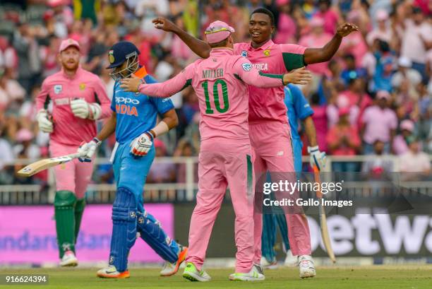 Lungi Ngidi of South Africa celebrates with teammate David Miller during the 4th Momentum ODI match between South Africa and India at Bidvest...