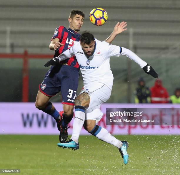 Davide Faraoni of Crotone competes for the ball with Andrea Petagna of Atalanta during the serie A match between FC Crotone and Atalanta BC at Stadio...