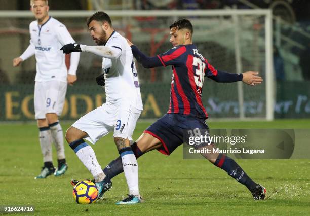 Rolando Mandragora of Crotone competes for the ball with Andrea Petagna of Atalanta during the serie A match between FC Crotone and Atalanta BC at...