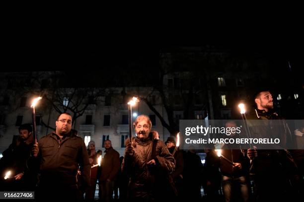 Members of the far-right movement "CasaPound" holds torches during the Day of Remembrance of the martyrs of the Foibe Istriane and the exodus of the...