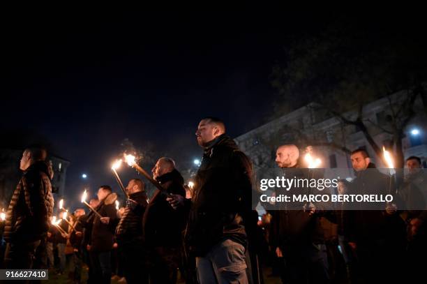 Members of the far-right movement "CasaPound" holds torches during the Day of Remembrance of the martyrs of the Foibe Istriane and the exodus of the...