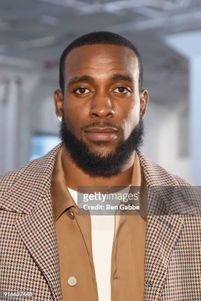 Professional football player Kam Chancellor attends the R13 fashion show during New York Fashion Week on February 10, 2018 in New York City.