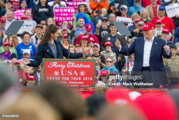 Press secretary Hope Hicks takes a bow for US President-elect Donald Trump after speaking during a 'Thank You Tour 2016' rally on December 17, 2016...