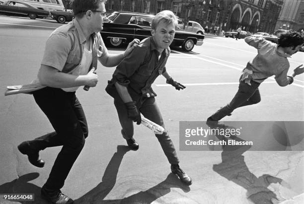 During a nationwide student strike , an unidentified neo-Nazi counter-protestor snarls at the camera, Washington DC, May 9, 1970. Visible in the...