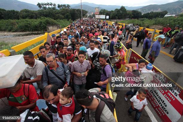 Venezuelan citizens cross the Simon Bolivar international bridge from San Antonio del Tachira in Venezuela to Norte de Santander province of Colombia...