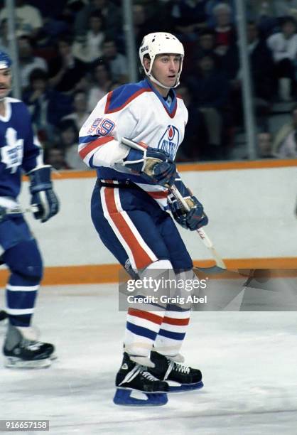 Wayne Gretzky of the Edmonton Oilers skates against the Toronto Maple Leafs during NHL game action on February 19, 1986 at Northlands Coliseum in...