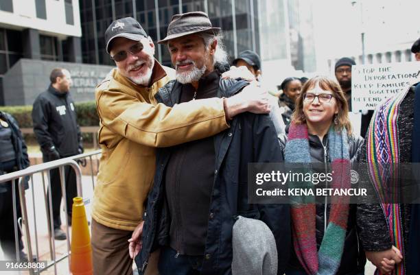 Immigrant rights activist Ravi Ragbir walks in front of the Immigration building during a Rally a day after he granted temporary stay of deportation...