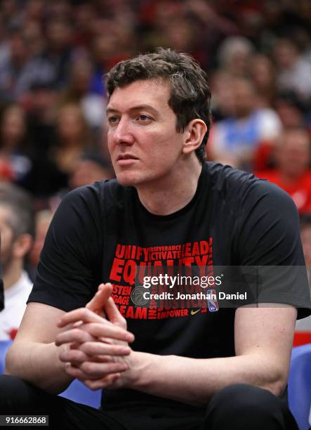 Omer Asik of the Chicago Bulls watches from the bench as his teammates take on the Minnesota Timberwolves at the United Center on February 9, 2018 in...