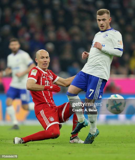 Arjen Robben of FC Bayern Muenchen fights for the ball with Max Meyer of FC Schalke 04 during the Bundesliga match between FC Bayern Muenchen and FC...