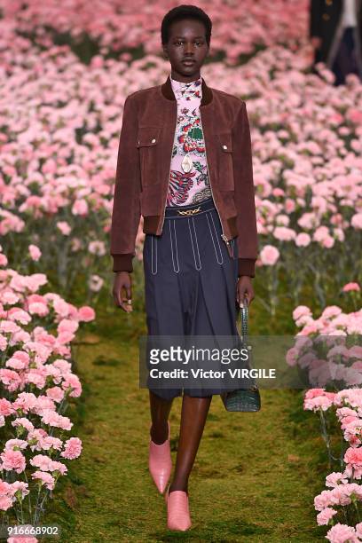 Model walks the runway during the Tory Burch Ready to Wear Fall/Winter 2018-2019 fashion show during New York Fashion Week at Bridge Market on...