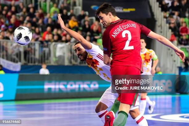 Portugals Andre Coelho vies with Spains Joselito during the European Futsal Championship final football match between Portugal and Spain at Arena...