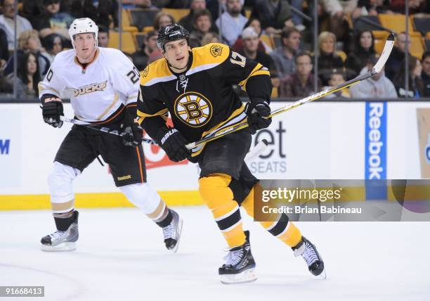 Milan Lucic of the Boston Bruins skates up the ice against the Anaheim Ducks at the TD Garden on October 8, 2009 in Boston, Massachusetts.