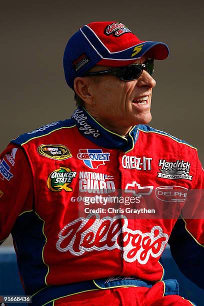 Mark Martin, driver of the Kellogg's/CARQUEST Chevrolet, stands on pit road during qualifying for the NASCAR Sprint Cup Series Pepsi 500 at Auto Club...