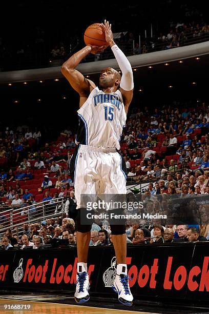 Vince Carter of the Orlando Magic shoots against the Houston Rockets during a pre-season game on October 9, 2009 at Amway Arena in Orlando, Florida....