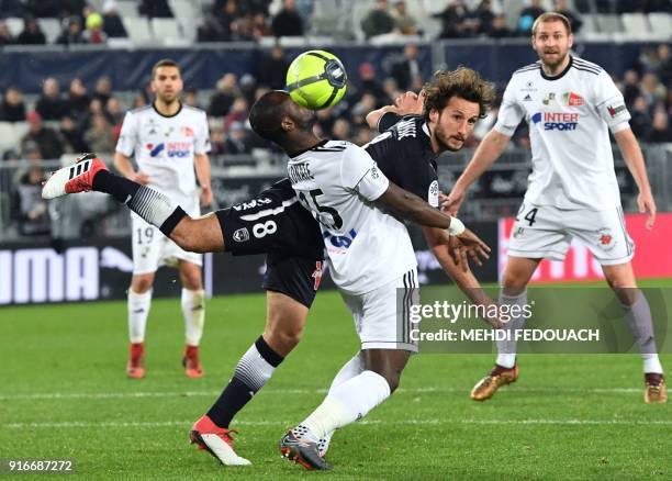 Bordeaux's French defender Paul Baysse vies for the ball with Amien's Cameroonian forward Pape Moussa Konate during the French L1 football match...