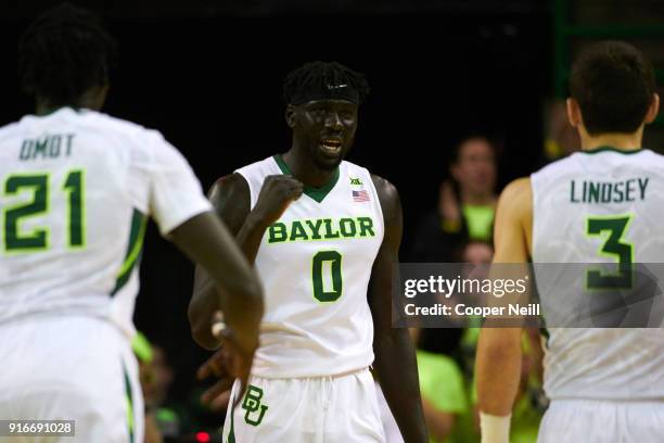 Jo Lual-Acuil Jr. #0 of the Baylor Bears celebrates after a made basket against the Kansas Jayhawks during the second half at the Ferrell Center on...