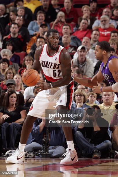 Greg Oden of the Portland Trail Blazers posts up against Sean May of the Sacramento Kings during the preseason game on October 6, 2009 at the Rose...