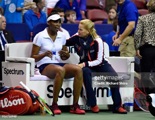 Team USA coach Kathy Rinaldi, right, speaks to Venus Williams of Team USA during her match with Arantxa Rus of the Netherlands in the first round of...