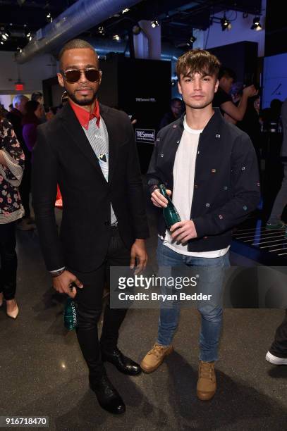 Actors Eric West and Samuel Mancini pose in front of the TRESemmé Salon at IMG NYFW: The Shows during IMG NYFW: The Shows at Spring Studios on...
