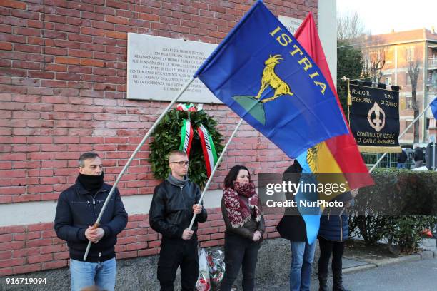 Supporters of Italian far-right movements CasaPound and Forza Nuova march behind a banner reading &quot;Honor to the martyrs of the foibe&quot;...