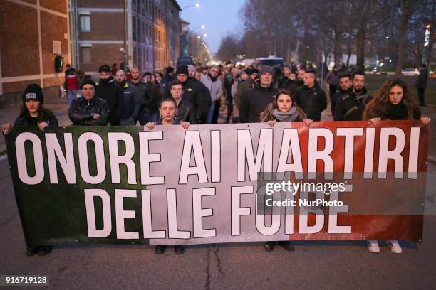 Supporters of Italian far-right movements CasaPound and Forza Nuova march behind a banner reading &quot;Honor to the martyrs of the foibe&quot;...