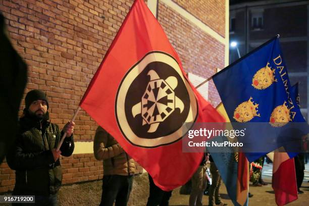 Supporters of Italian far-right movements CasaPound and Forza Nuova march behind a banner reading &quot;Honor to the martyrs of the foibe&quot;...