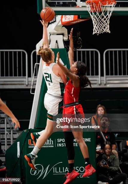 Miami forward/center Emese Hof shoots during a women's college basketball game between the NC State University Wolfpack and the University of Miami...