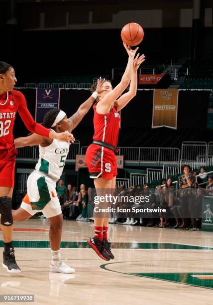 State guard Aislinn Konig shoots during a women's college basketball game between the NC State University Wolfpack and the University of Miami...