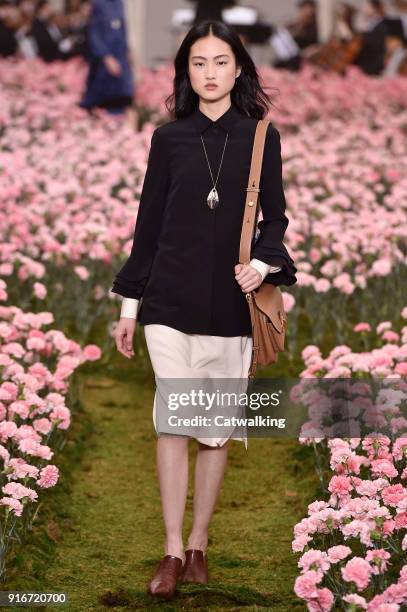 Model walks the runway at the Tory Burch Autumn Winter 2018 fashion show during New York Fashion Week on February 9, 2018 in New York, United States.