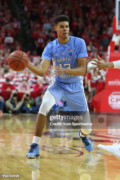 North Carolina guard Cameron Johnson passes to a teammate during the game between the North Carolina Tar Heels and the NC State Wolfpack at PNC Arena...