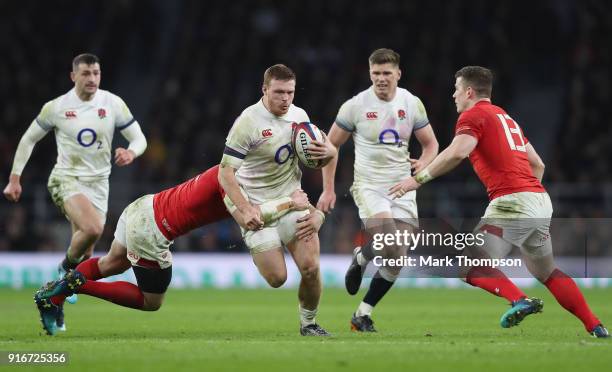 Danny Care of England is tackled during the NatWest Six Nations round two match between England and Wales at Twickenham Stadium on February 10, 2018...