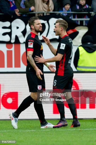 Marco Gruettner of Regensburg celebrates after scoring his team`s first goal with Benedikt Saller of Regensburg during the Second Bundesliga match...