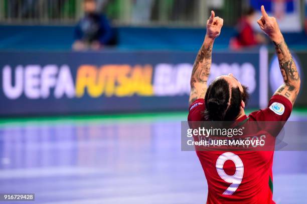 Portugal's Joao Matos celebrates after winning the European Futsal Championship at Arena Stozice in Ljubljana, Slovenia on February 10, 2018. / AFP...