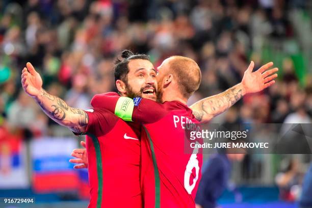 Portugal's Joao Matos and Pedro Cary celebrate after winning the European Futsal Championship at Arena Stozice in Ljubljana, Slovenia on February 10,...