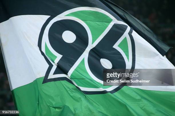 Hannover fans wave a flag during the Bundesliga match between Hannover 96 and Sport-Club Freiburg at HDI-Arena on February 10, 2018 in Hanover,...