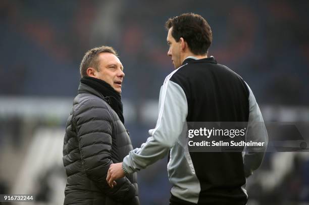 Headcoach Andre Breitenreiter of Hannover 96 argues with referee Manuel Graefe prior to the Bundesliga match between Hannover 96 and Sport-Club...