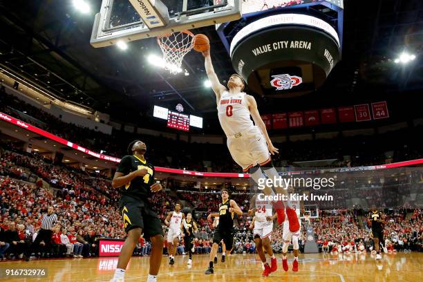 Micah Potter of the Ohio State Buckeyes attempts to dunk the ball during the first half of the game against the Iowa Hawkeyes at Value City Arena on...