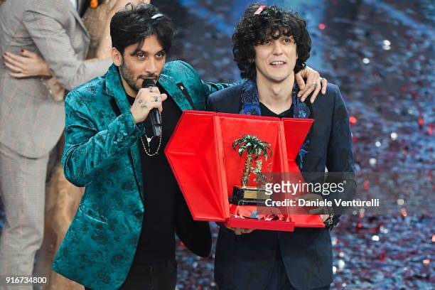 Ermal Meta and Fabrizio Moro, winners of the 68th Italian Music Festival in Sanremo, pose with the award at the Ariston theatre duringthe closing...