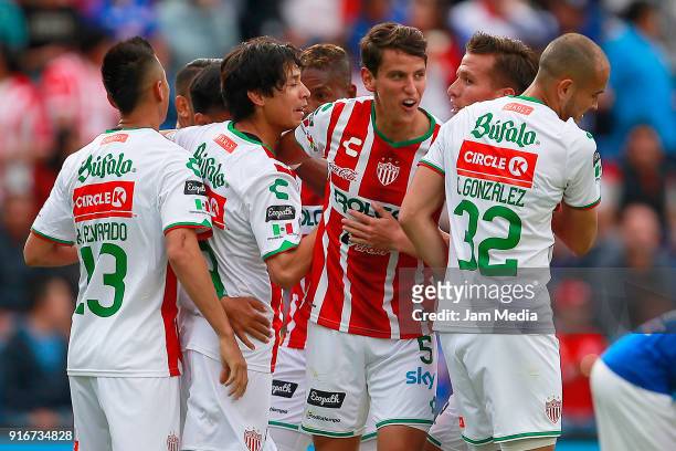 Dieter Villalpando of Necaxa celebrates with teammates after scoring the first goal during the 6th round match between Cruz Azul and Necaxa as part...