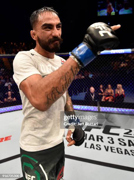 Jose Quinonez of Mexico celebrates his victory over Teruto Ishihara of Japan in their bantamweight bout during the UFC 221 event at Perth Arena on...