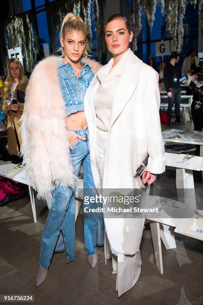 Devon Windsor and Kate Upton attend the Jonathan Simkhai fashion show during New York Fashion Week at Gallery I at Spring Studios on February 10,...