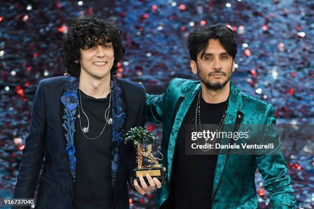 Ermal Meta and Fabrizio Moro, winners of the 68th Italian Music Festival in Sanremo, pose with the award at the Ariston theatre duringthe closing...