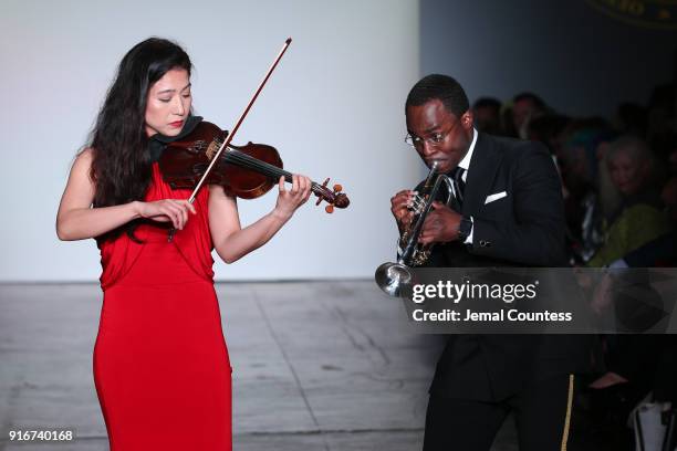 Musicians perform on stage for the CAAFD Emerging Designer Collective during New York Fashion Week: The Shows at at Industria Studios on February 10,...