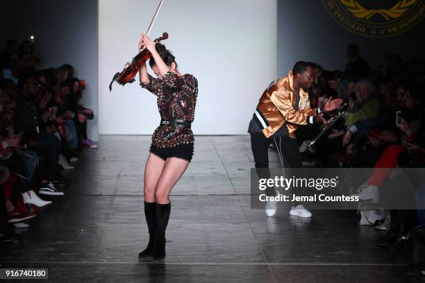 Musicians perform on stage for the CAAFD Emerging Designer Collective during New York Fashion Week: The Shows at at Industria Studios on February 10,...